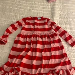 red and pink striped dress with letter C
